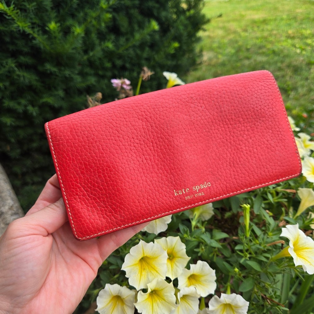 kate spade bifold pebble leather wallet.‎ In red. Flaws